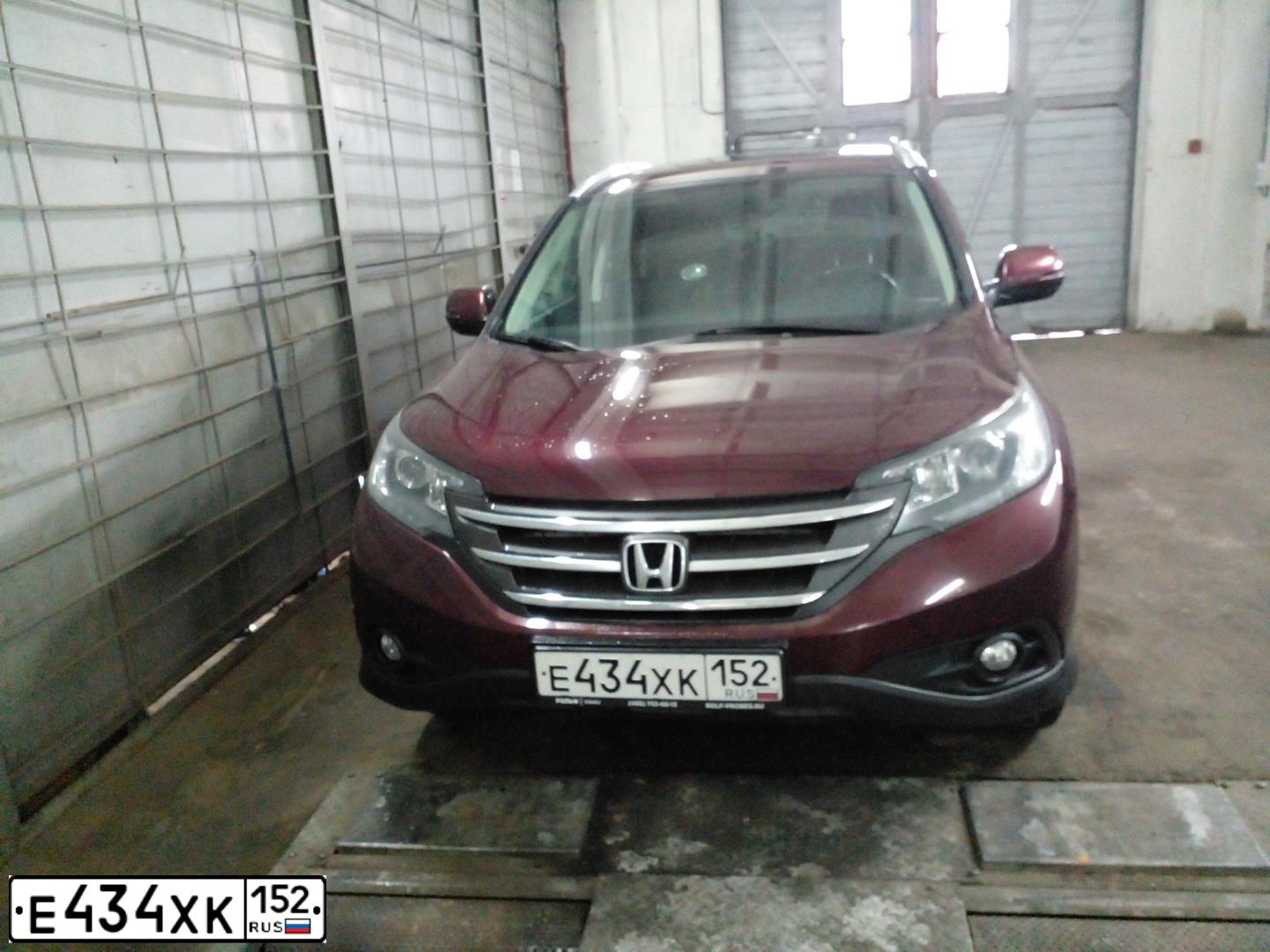 Фото автомобиля SKODA OCTAVIA, 2011 — госномер Е434ХК152. Цвет: Белый