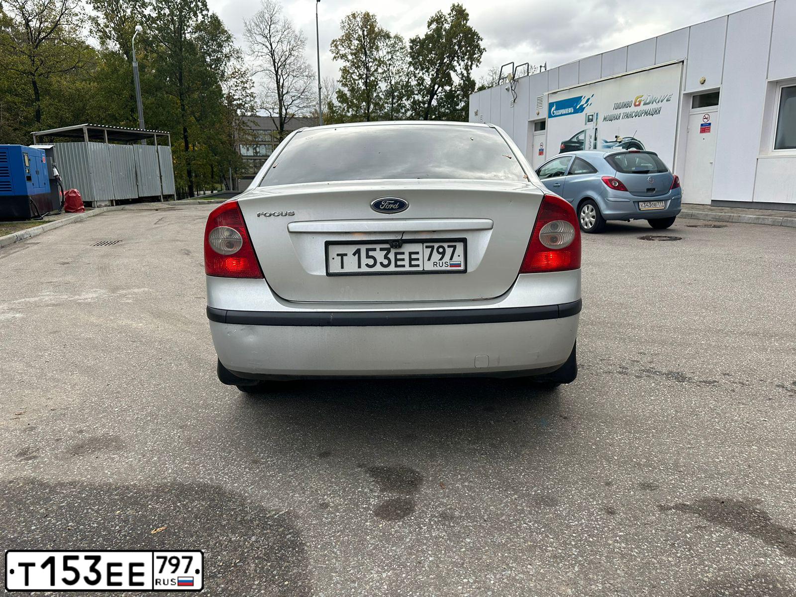 Фото автомобиля FORD FOCUS, 2005 — госномер М721УС69. Цвет: Серебристый