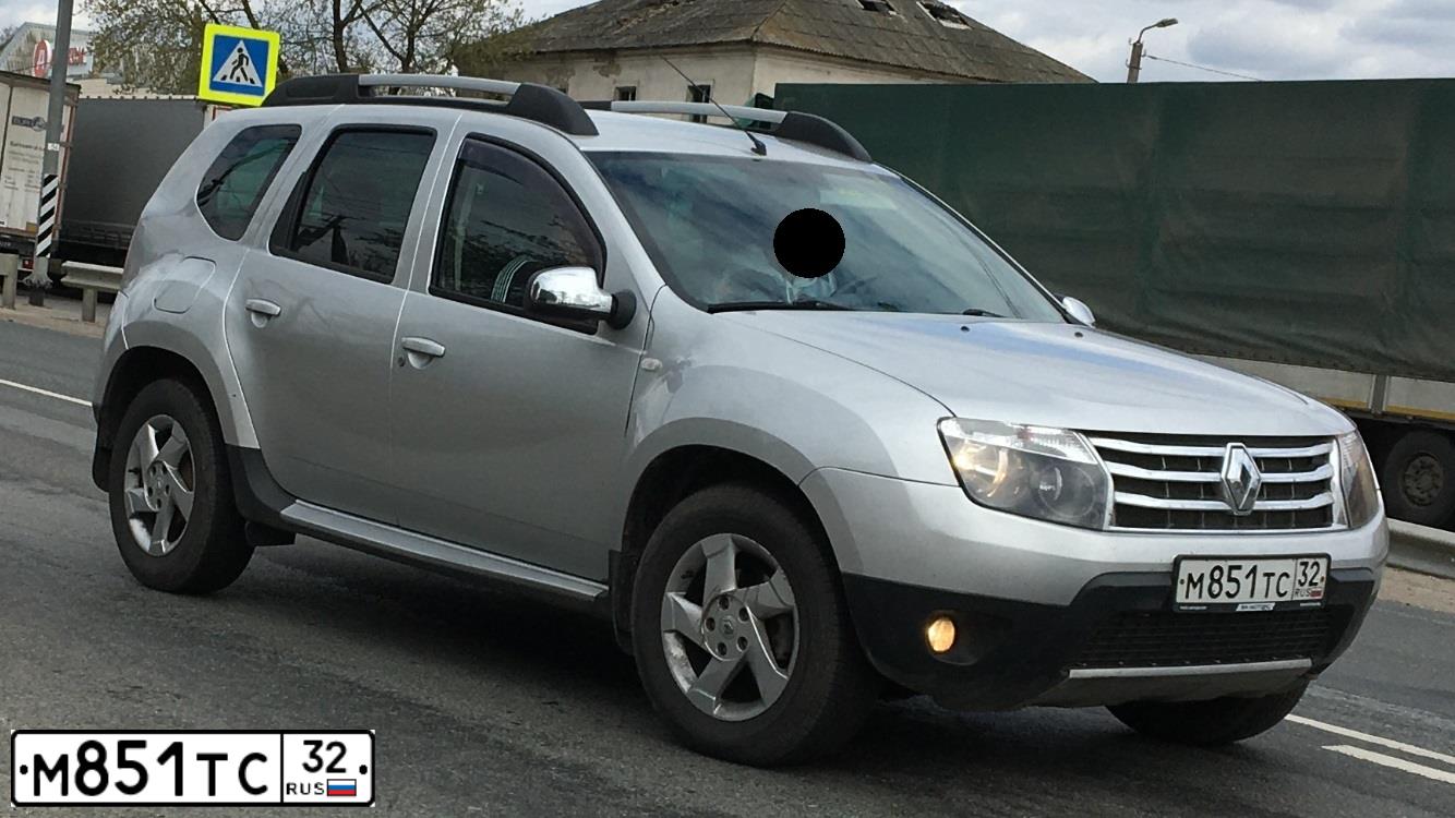 Фото автомобиля RENAULT DUSTER, 2011 — госномер М217ММ67. Цвет: СВЕТЛО-СЕРЫЙ