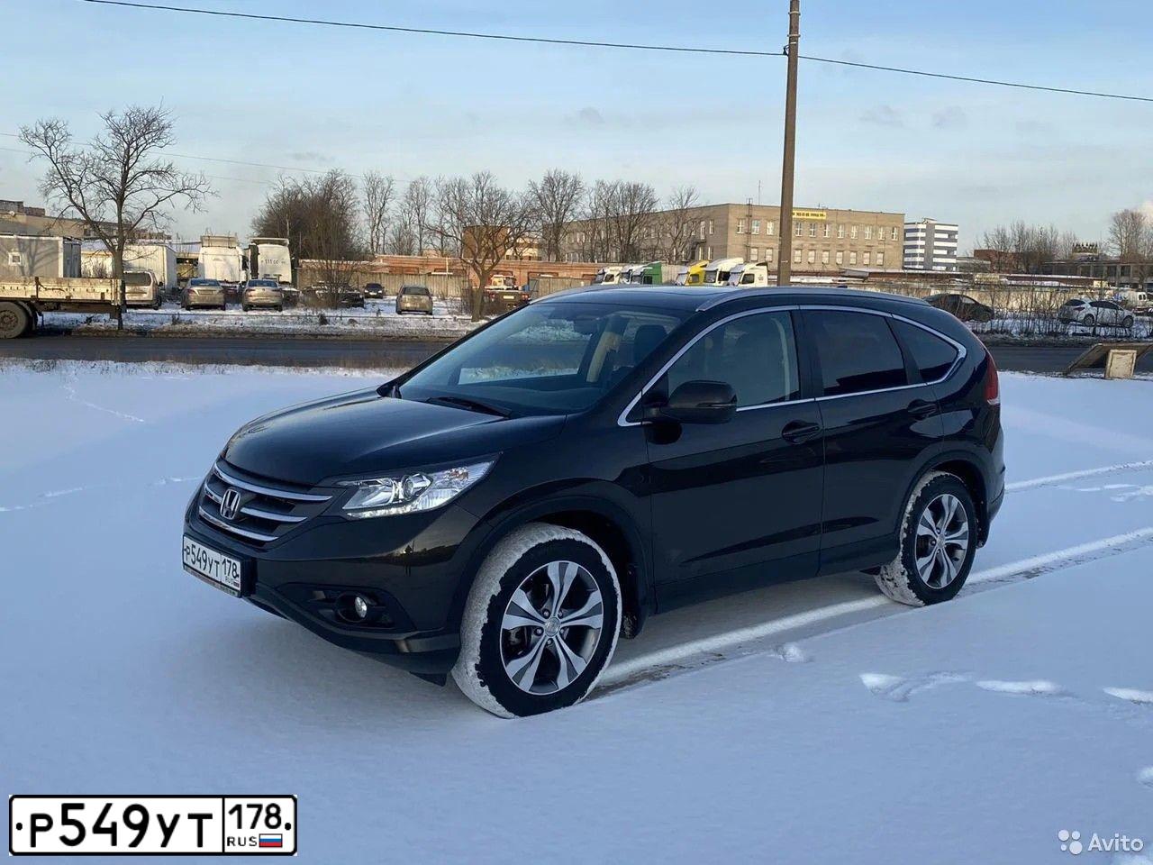 Фото автомобиля HONDA CR-V, 2014 — госномер О725КС29. Цвет: ТЕМНО-КОРИЧНЕВЫЙ