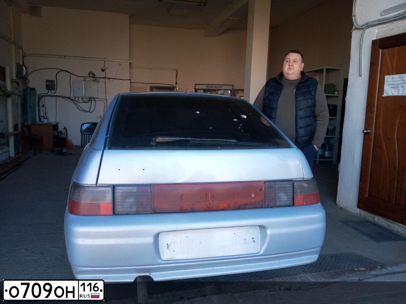 Фото автомобиля LADA 2112, 2007 — госномер Т205НР73. Цвет: СЕРЕБРИСТО-ГОЛУБОЙ