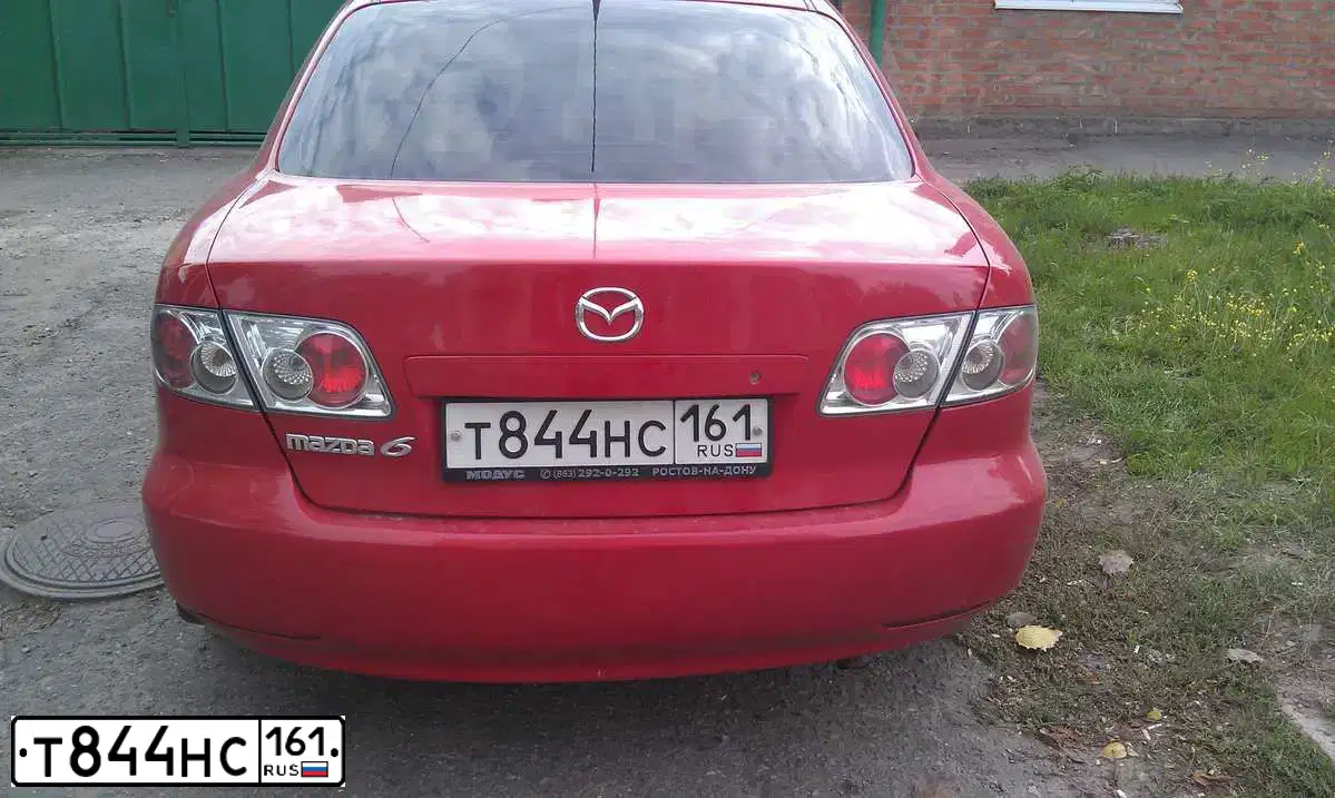 Фото автомобиля MAZDA 6, 2004 — госномер Т844НС161. Цвет: Красный