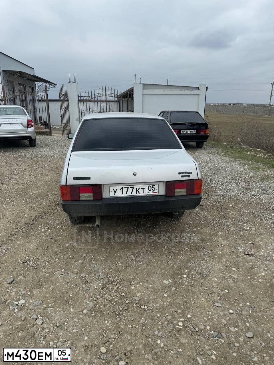 Фото автомобиля LADA 2114 SAMARA, 2009 — госномер М430ЕМ05. Цвет: ГРАФИТОВЫЙ МЕТАЛЛИК