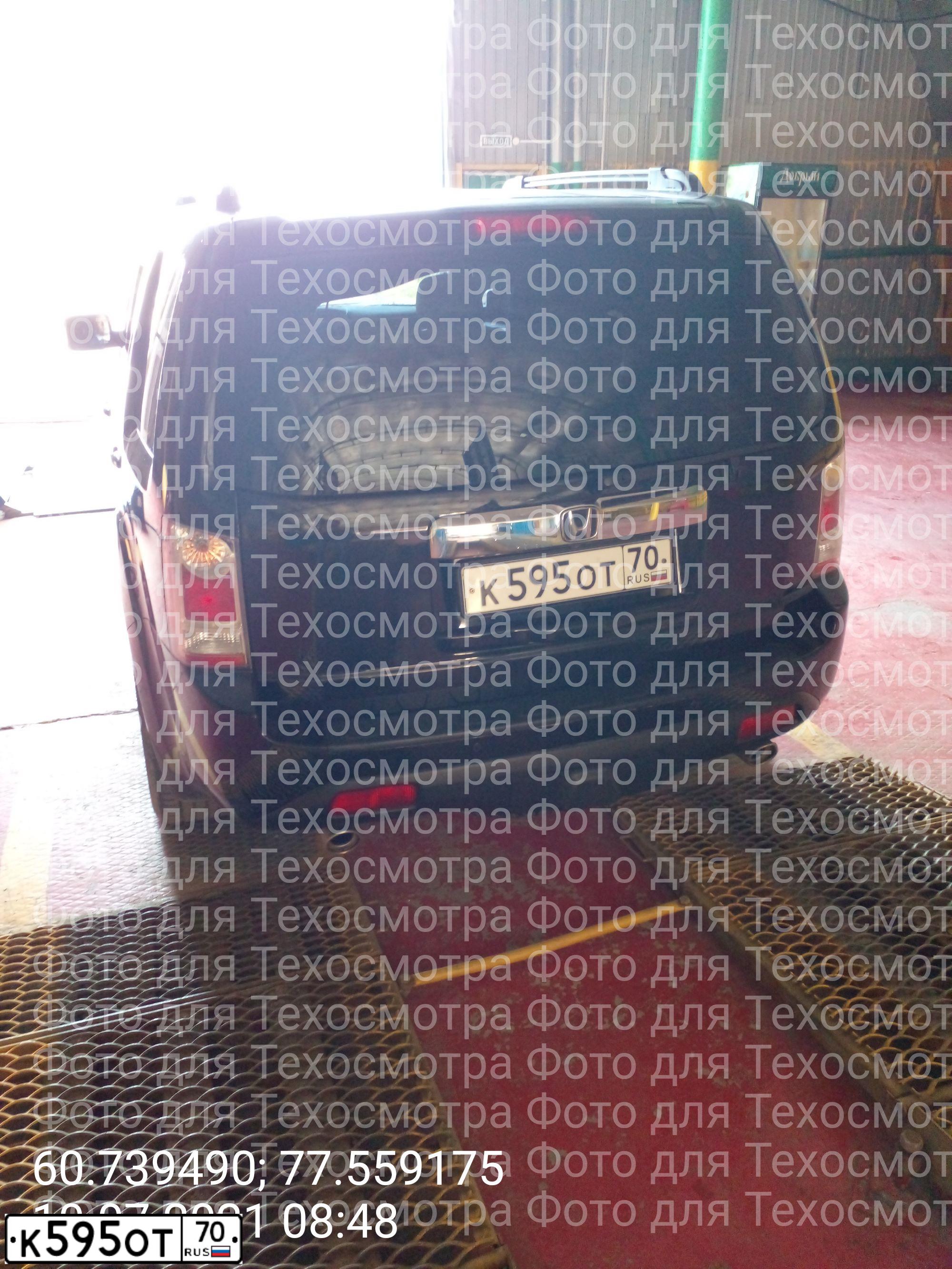 Фото автомобиля FORD FOCUS, 2010 — госномер К136ММ186. Цвет: ЧЕРНЫЙ