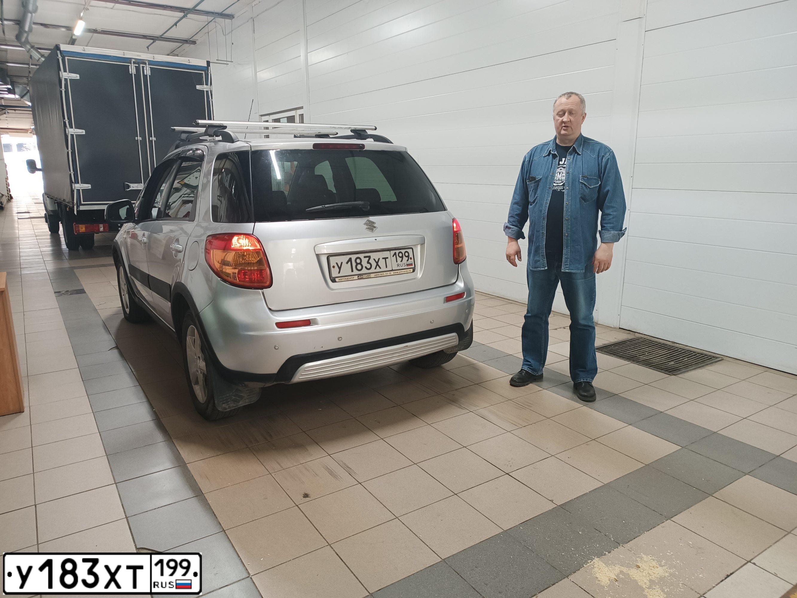 Фото автомобиля SUZUKI SX 4, 2007 — госномер Е314УТ18. Цвет: СЕРЫЙ