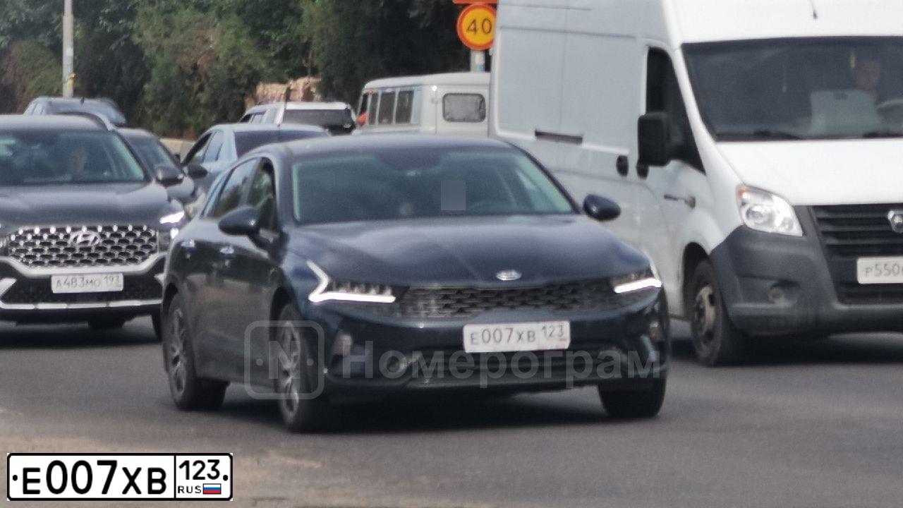 Фото автомобиля FORD FOCUS, 2009 — госномер Е007ХВ123. Цвет: СЕРО-ГОЛУБОЙ