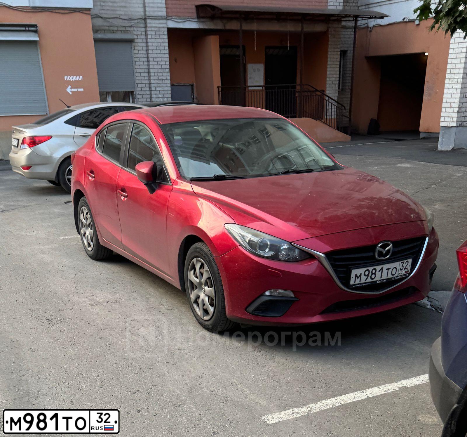 Фото автомобиля MAZDA 3, 2013 — госномер Р519КТ32. Цвет: КРАСНЫЙ