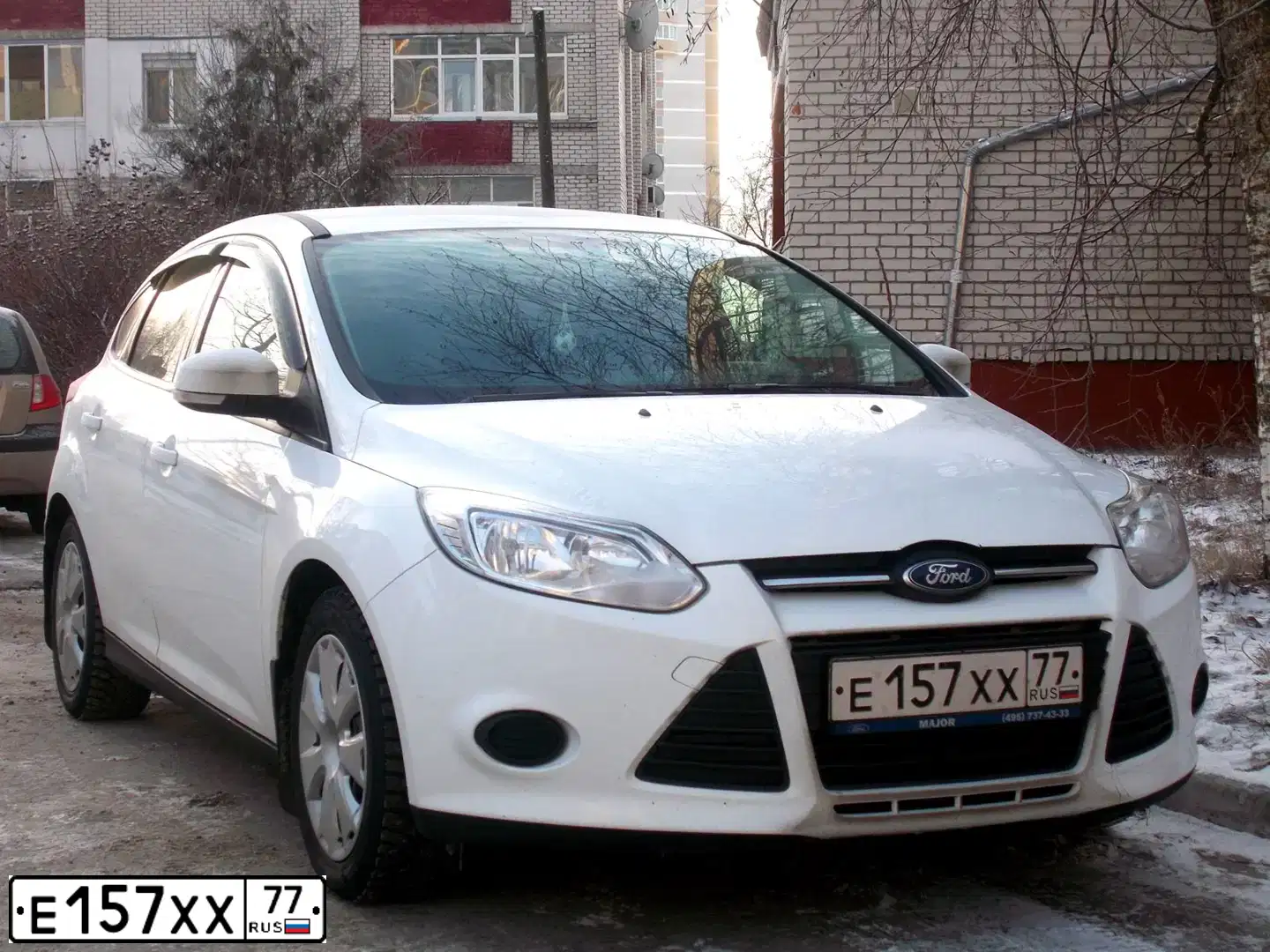 Фото автомобиля FORD FOCUS, 2013 — госномер А454ТО62. Цвет: Белый