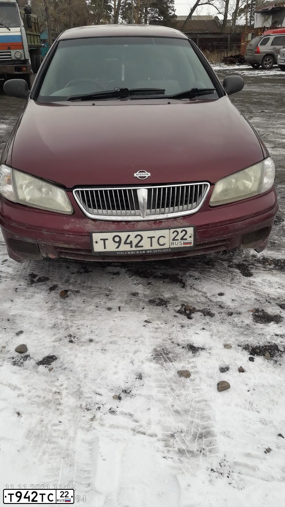 Фото автомобиля NISSAN SUNNY, 2001 — госномер Т942ТС22. Цвет: ТЕМНО КРАСНЫЙ