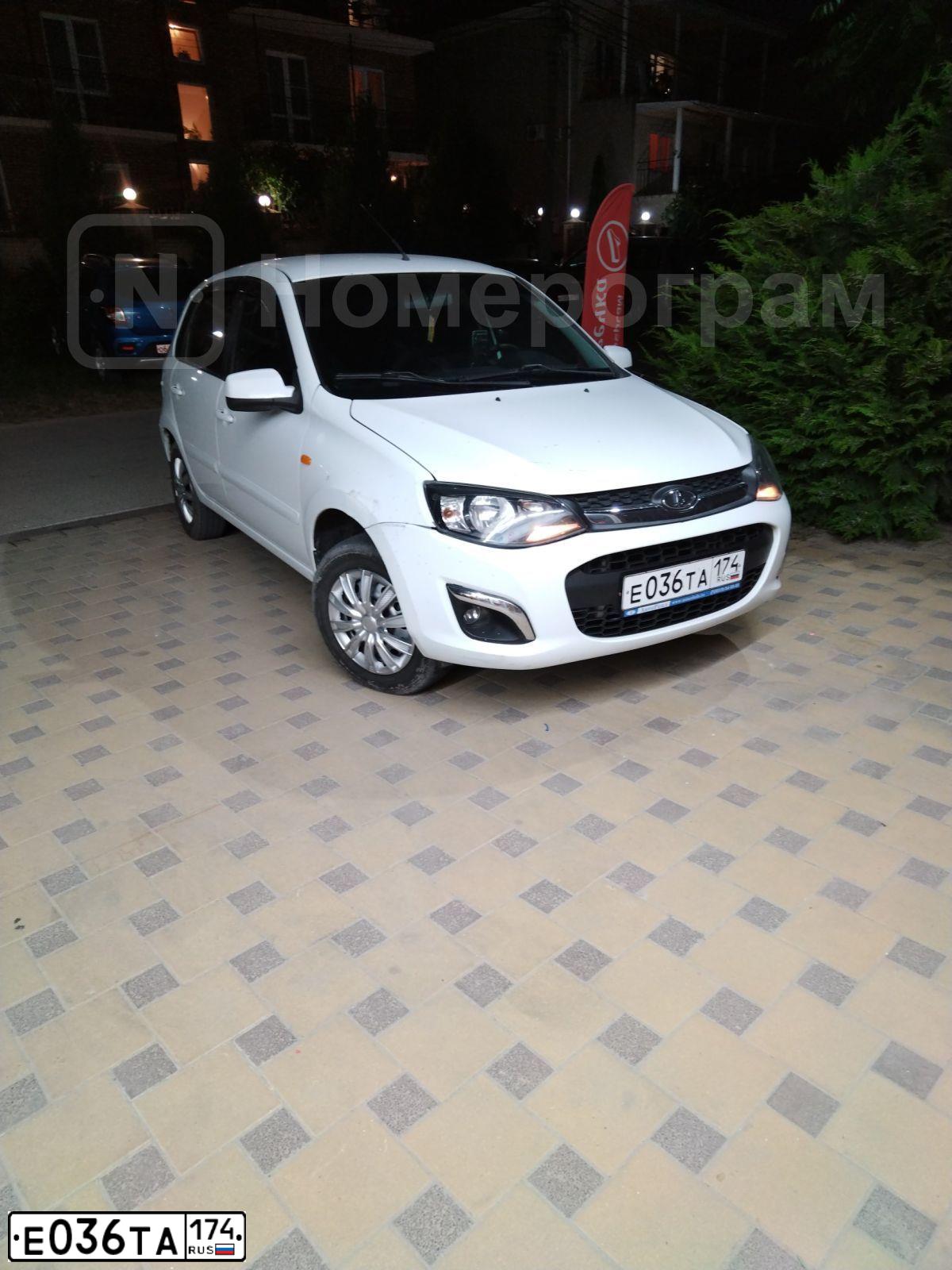 Фото автомобиля LADA 2192 KALINA, 2013 — госномер Е036ТА174. Цвет: БЕЛЫЙ