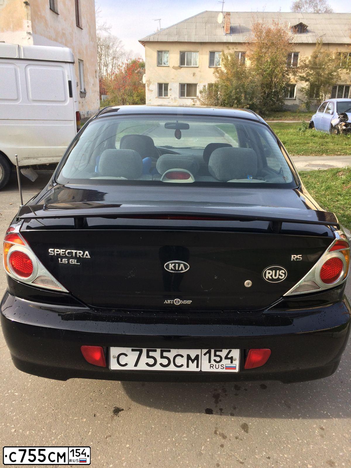 Фото автомобиля KIA SPECTRA, 2006 — госномер С755СМ154. Цвет: ЧЕРНЫЙ ГРАФИТ