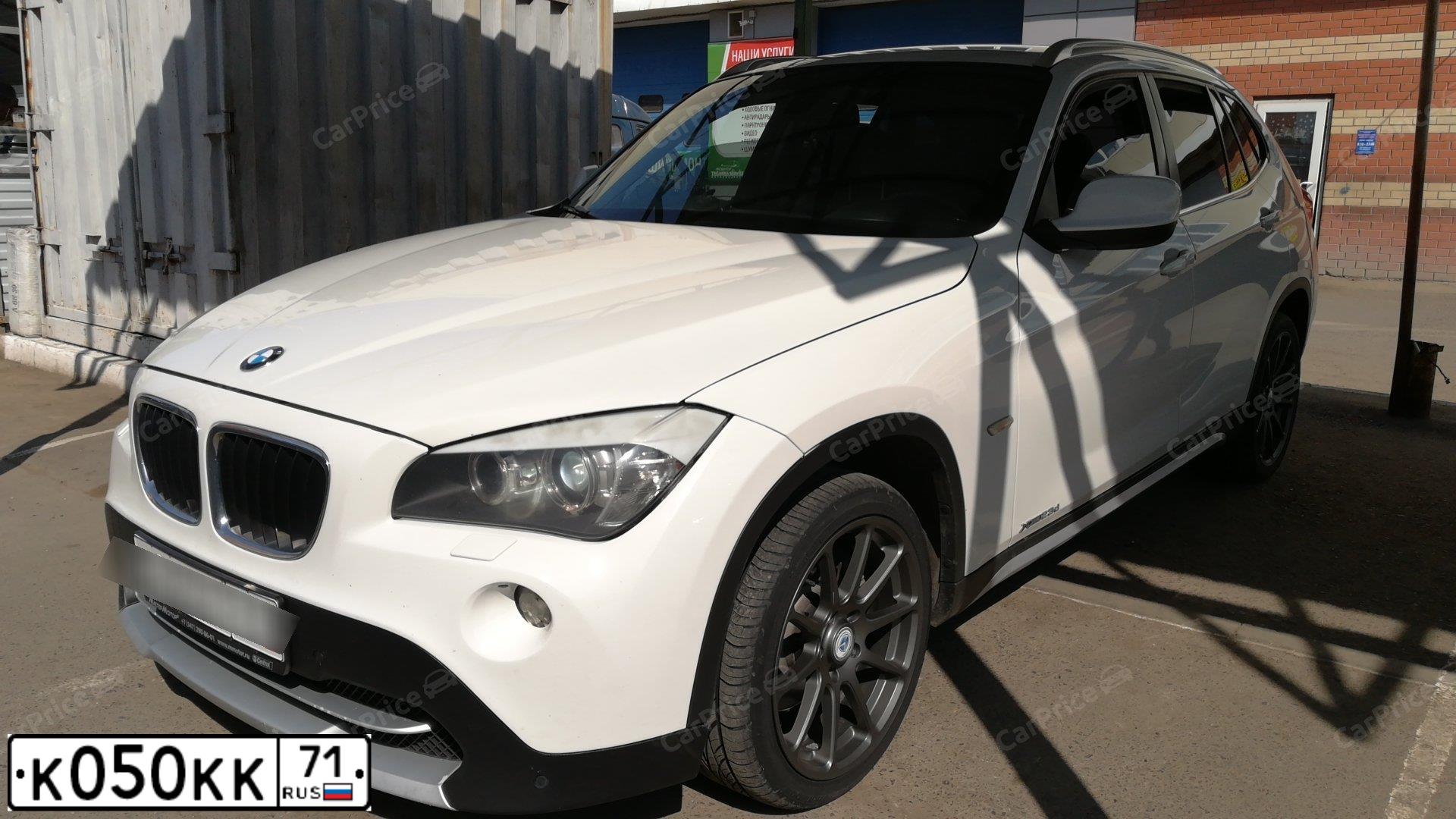 Фото автомобиля BMW X1, 2011 — госномер К050КК71. Цвет: БЕЛЫЙ