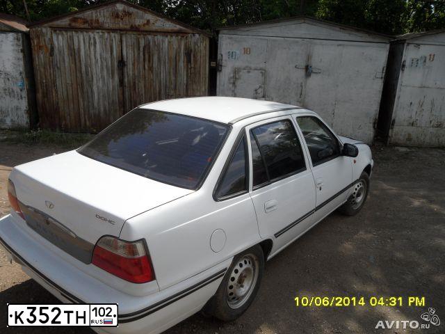 Фото автомобиля DAEWOO O NEXIA, 2005 — госномер К495ВС702. Цвет: Белый