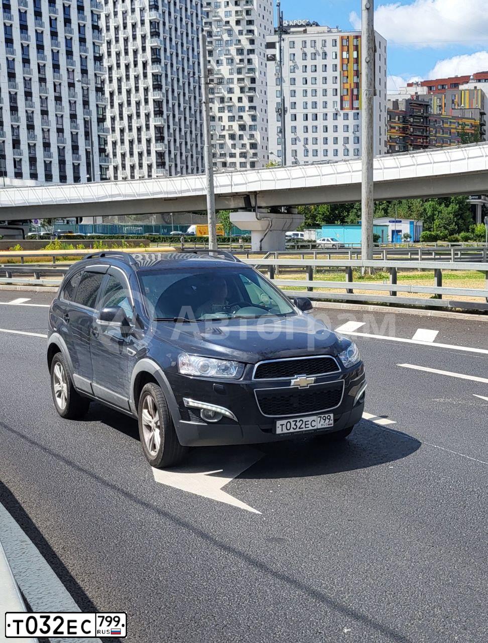 Фото автомобиля CHEVROLET CAPTIVA, 2013 — госномер Т032ЕС799. Цвет: ЧЕРНЫЙ