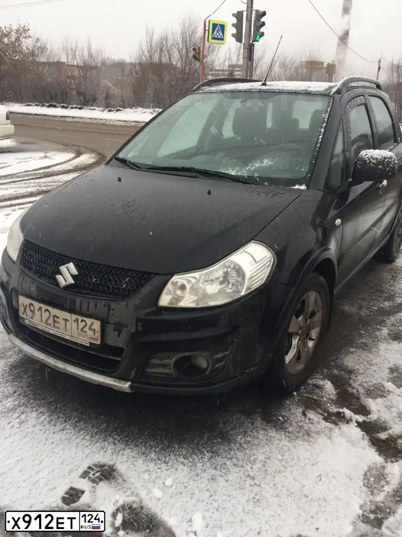 Фото автомобиля SUZUKI SX 4, 2012 — госномер Х912ЕТ124. Цвет: ЧЕРНЫЙ