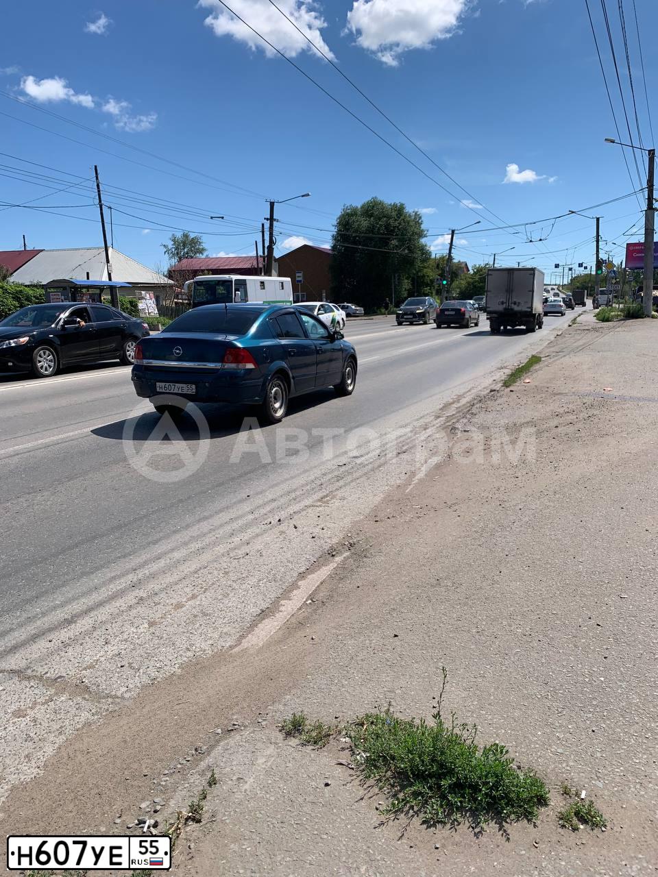 Фото автомобиля OPEL ASTRA, 2007 — госномер Н607УЕ55. Цвет: ТЕМНО-СИНИЙ