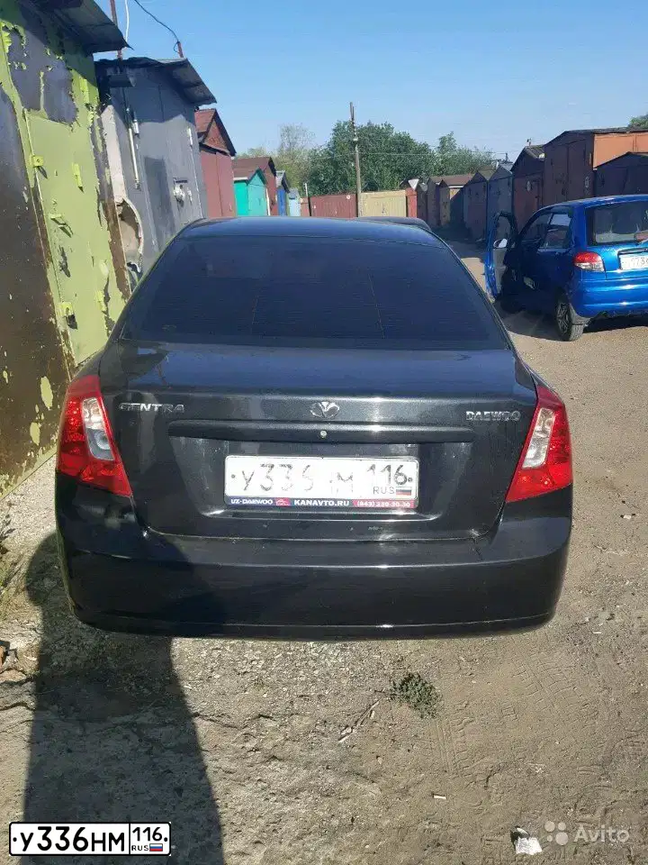 Фото автомобиля DAEWOO GENTRA, 2014 — госномер У405УЕ43. Цвет: Бледно-Черный