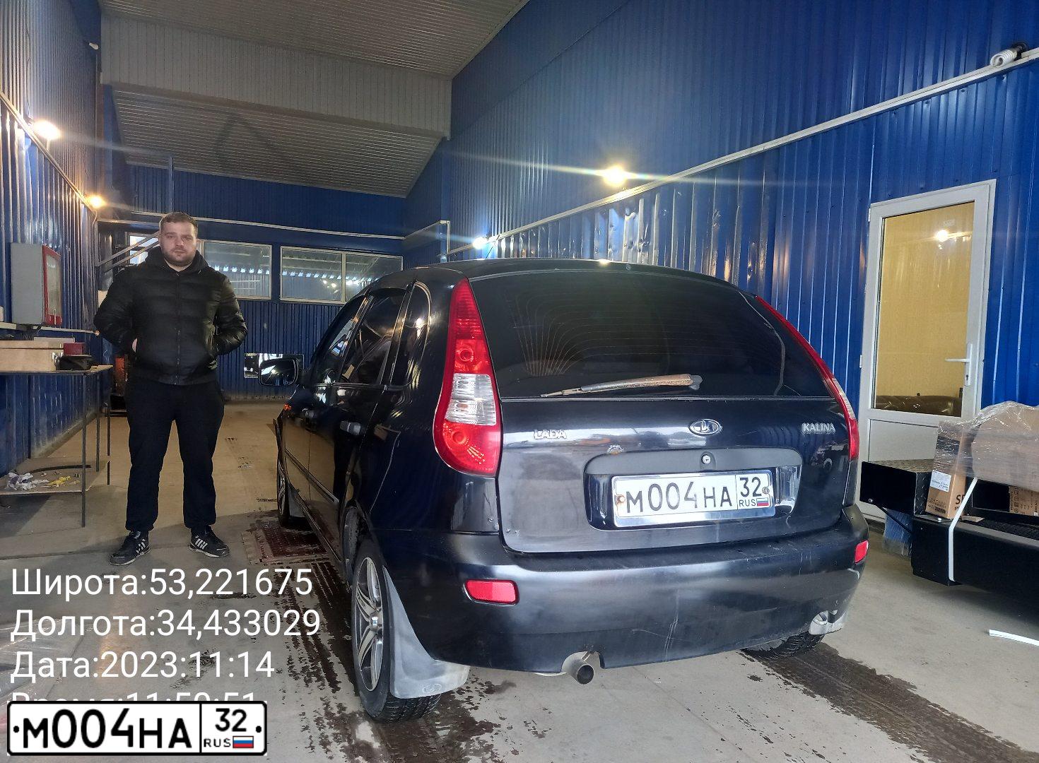 Фото автомобиля LADA 1119 KALINA, 2012 — госномер Р235ВЕ32. Цвет: СИНЕ-ЧЕРНЫЙ