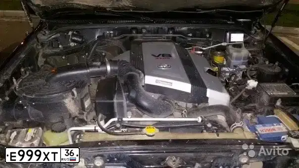 Фото автомобиля TOYOTA LANDCRUISER, 2002 — госномер О001НТ90. Цвет: ЧЕРНЫЙ