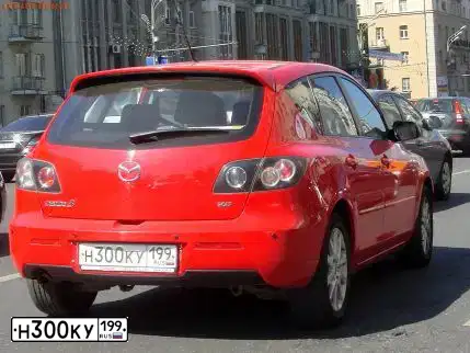 Фото автомобиля MAZDA 3, 2008 — госномер К634КЕ977. Цвет: Красный