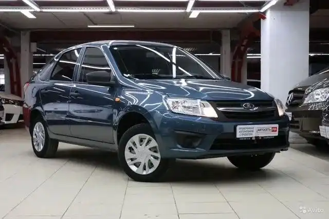 Фото автомобиля LADA 2191 GRANTA, 2014 — госномер Е947КО716. Цвет: СЕРО-СИНИЙ