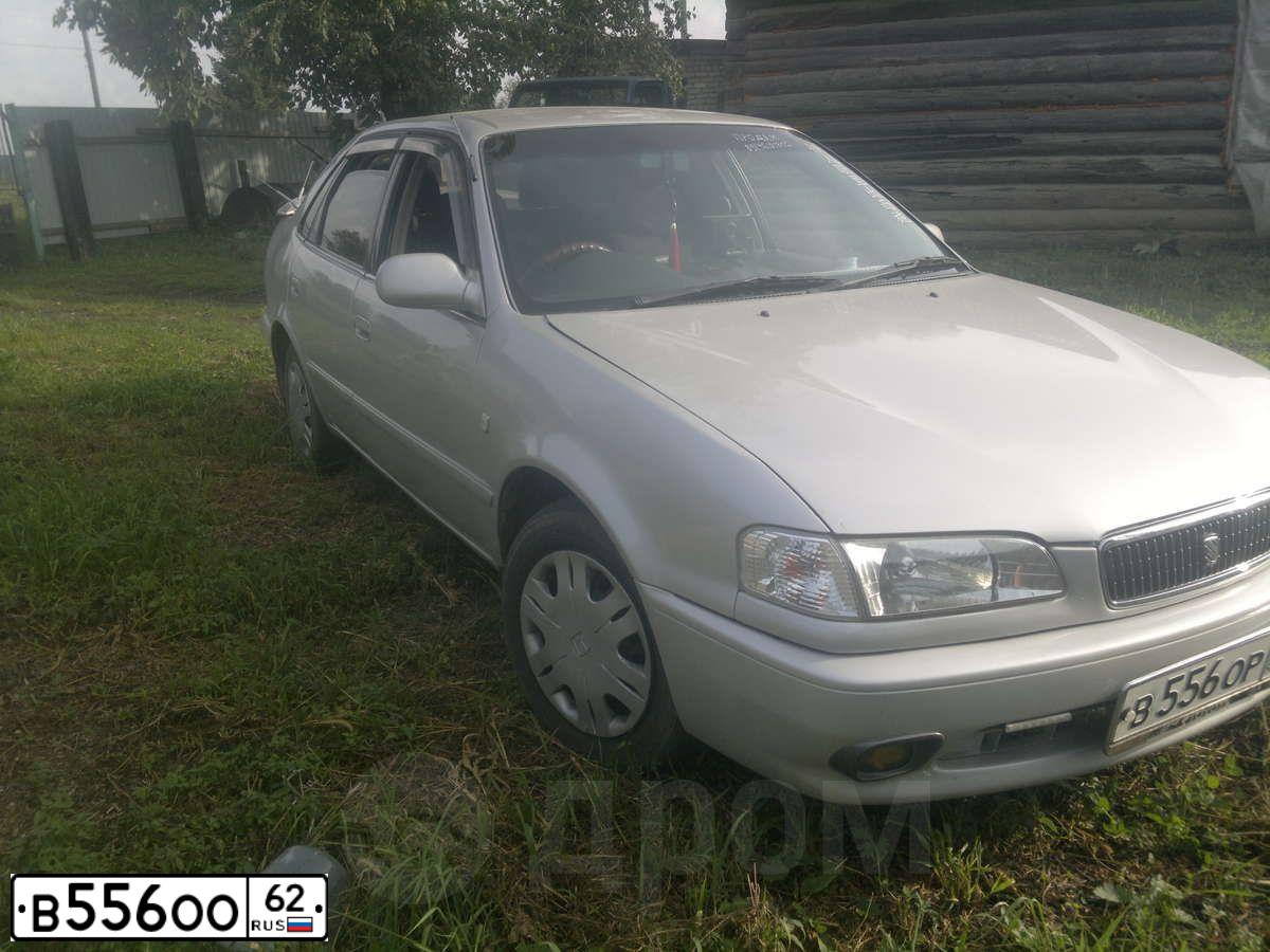 Фото автомобиля LADA 2112 LADA, 2007 — госномер В556ОО62. Цвет: БЕЖЕВО-СИРЕНЕВЫЙ