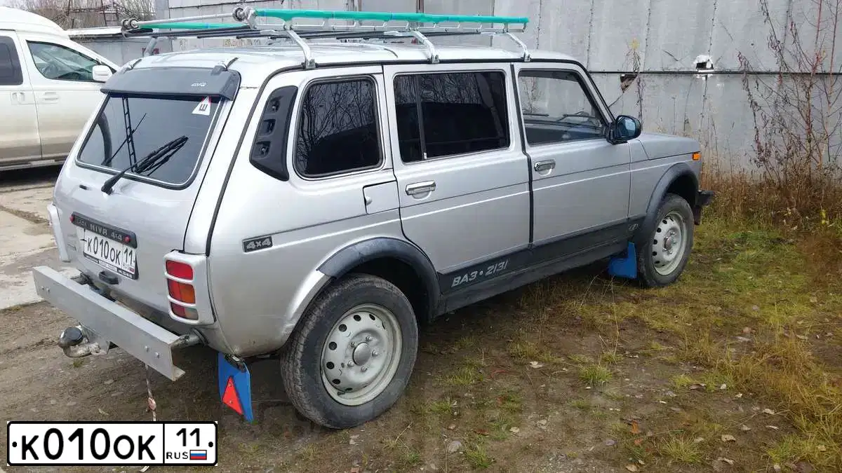 Фото автомобиля NISSAN PATHFINDER, 2007 — госномер К010ОК11. Цвет: СЕРЫЙ