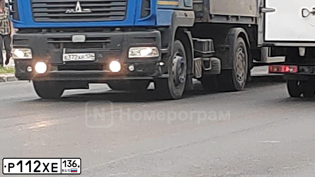 Фото автомобиля KIA SPECTRA, 2008 — госномер Р112ОЕ36. Цвет: ТЕМНО-СИНИЙ (СИНИЙ)