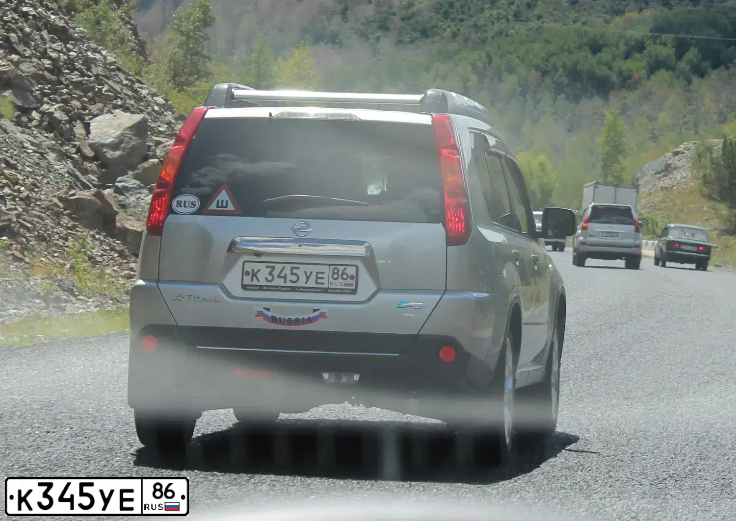 Фото автомобиля NISSAN X-TRAIL, 2010 — госномер К345УЕ86. Цвет: СЕРЕБРИСТЫЙ
