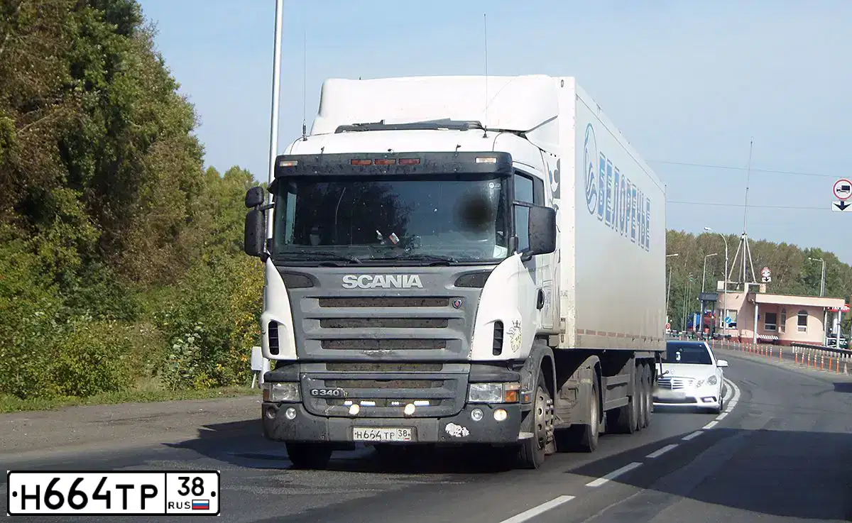 Фото автомобиля SCANIA SERIE G /4X2/, 2008 — госномер Н664ТР38. Цвет: Белый