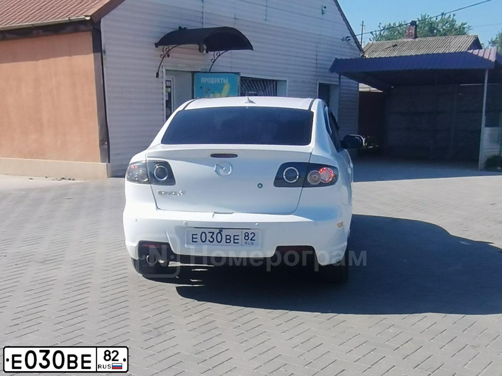 Фото автомобиля MAZDA 3, 2008 — госномер Е030ВЕ82. Цвет: Белый