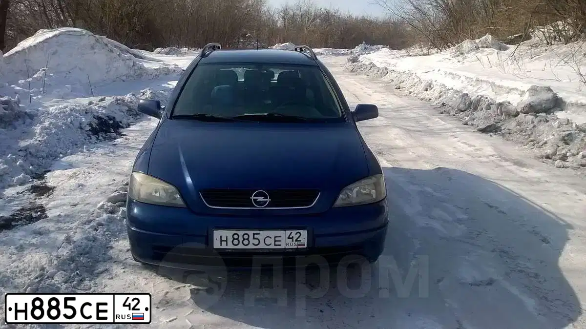 Фото автомобиля OPEL ASTRA, 2003 — госномер Н885СЕ42. Цвет: синий