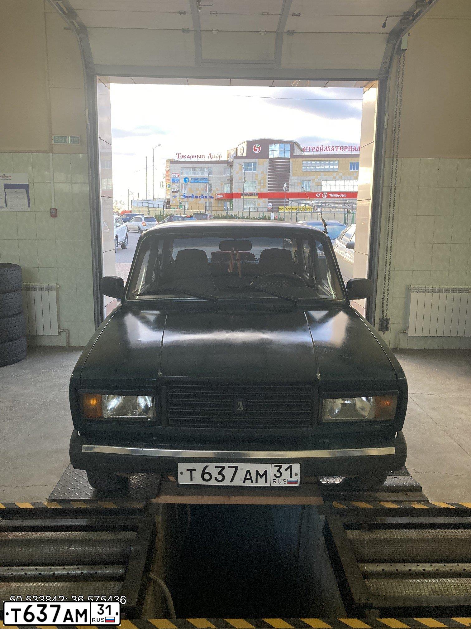 Фото автомобиля LADA 2107 LADA, 2007 — госномер Т637АМ31. Цвет: ТЕМНО-ЗЕЛЕНЫЙ