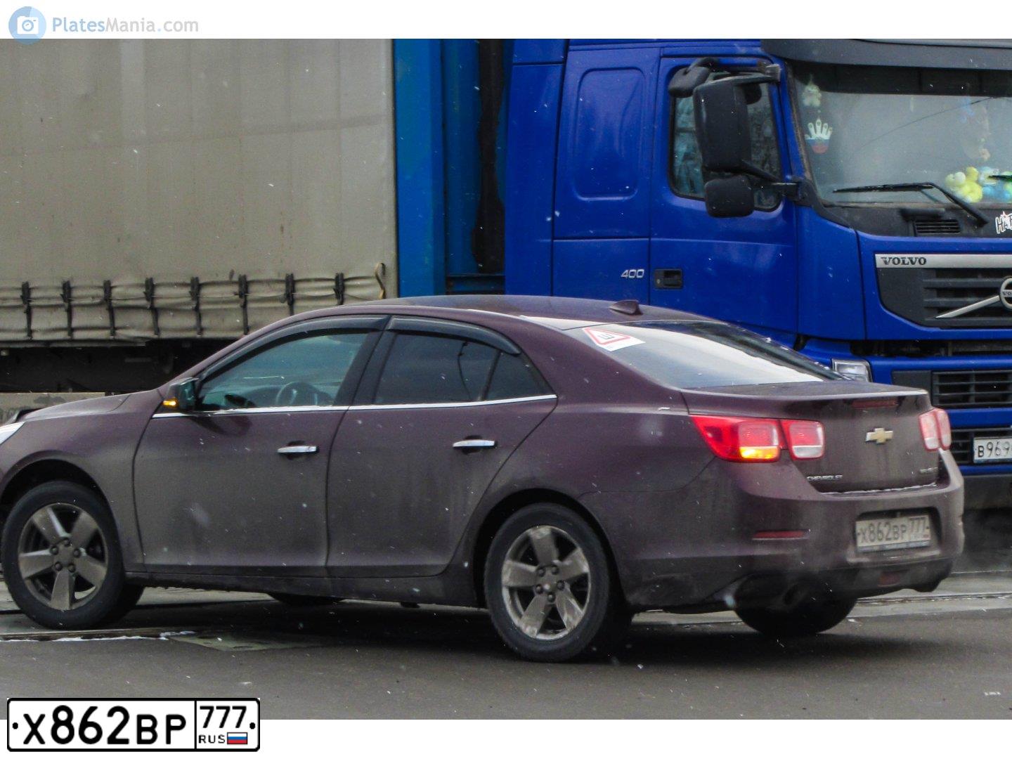 Фото автомобиля CHEVROLET MALIBU, 2012 — госномер О759РХ198. Цвет: Красный
