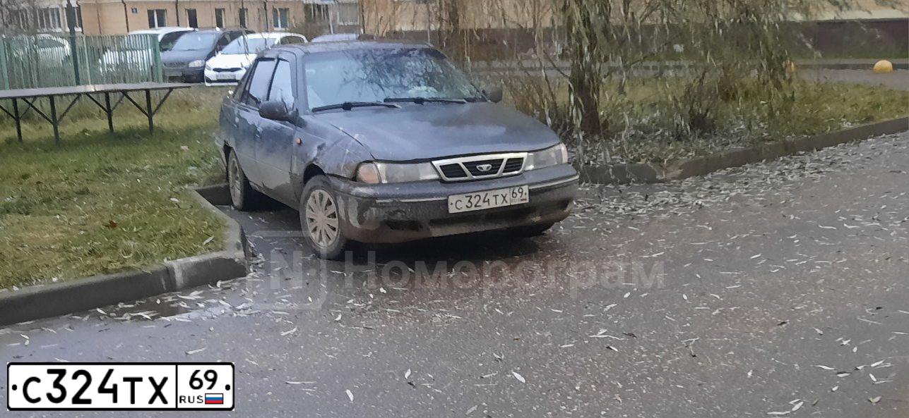 Фото автомобиля DAEWOO NEXIA, 2003 — госномер Х547РМ69. Цвет: Темно-зеленый