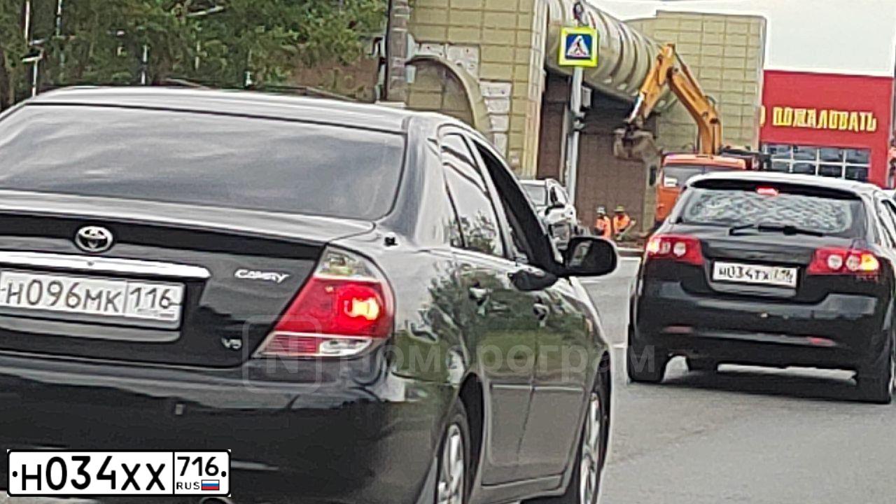 Фото автомобиля KIA CERATO, 2011 — госномер Н034ХХ716. Цвет: Белый