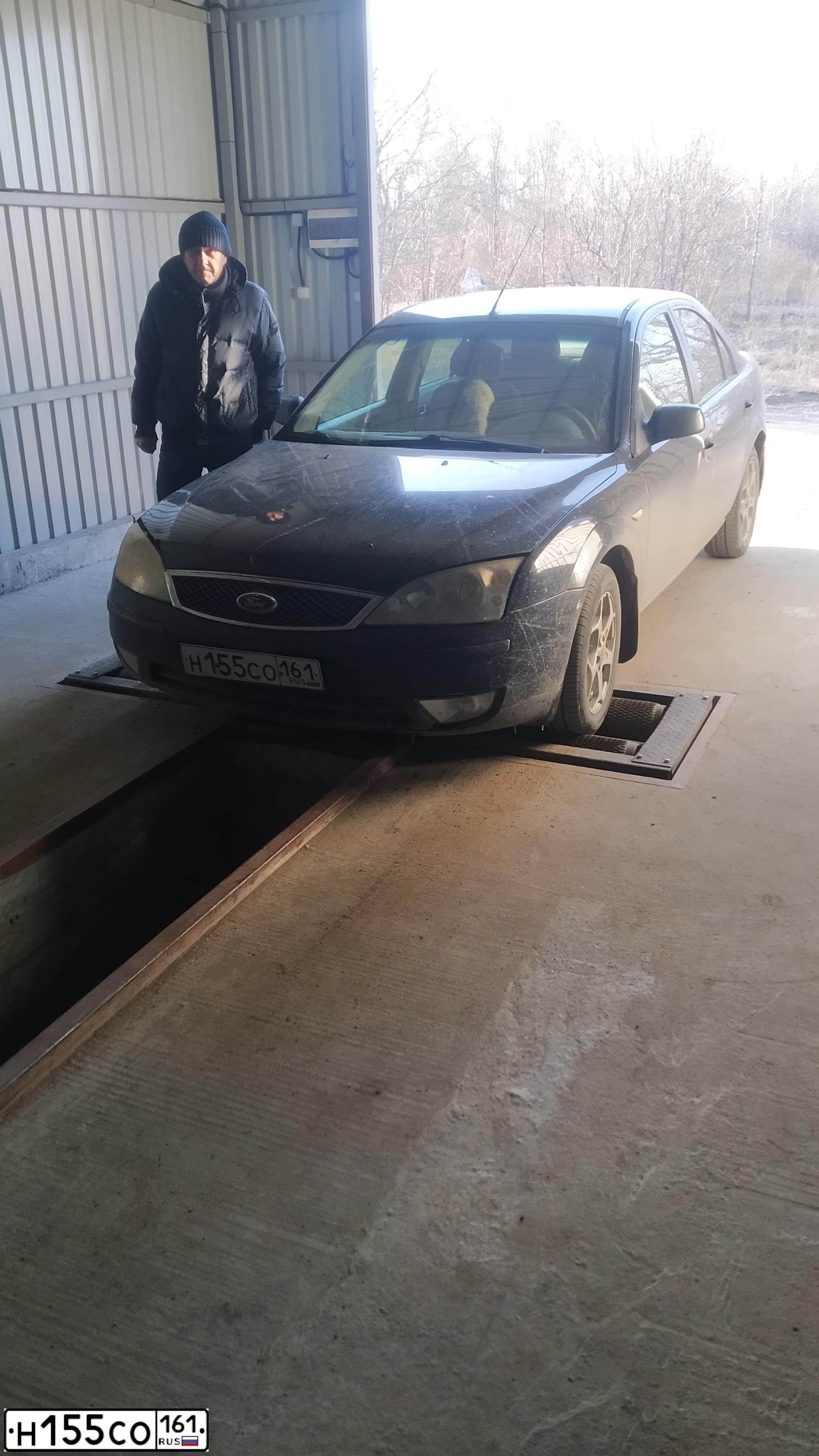 Фото автомобиля FORD MONDEO, 2005 — госномер Н155СО161. Цвет: ЧЕРНЫЙ