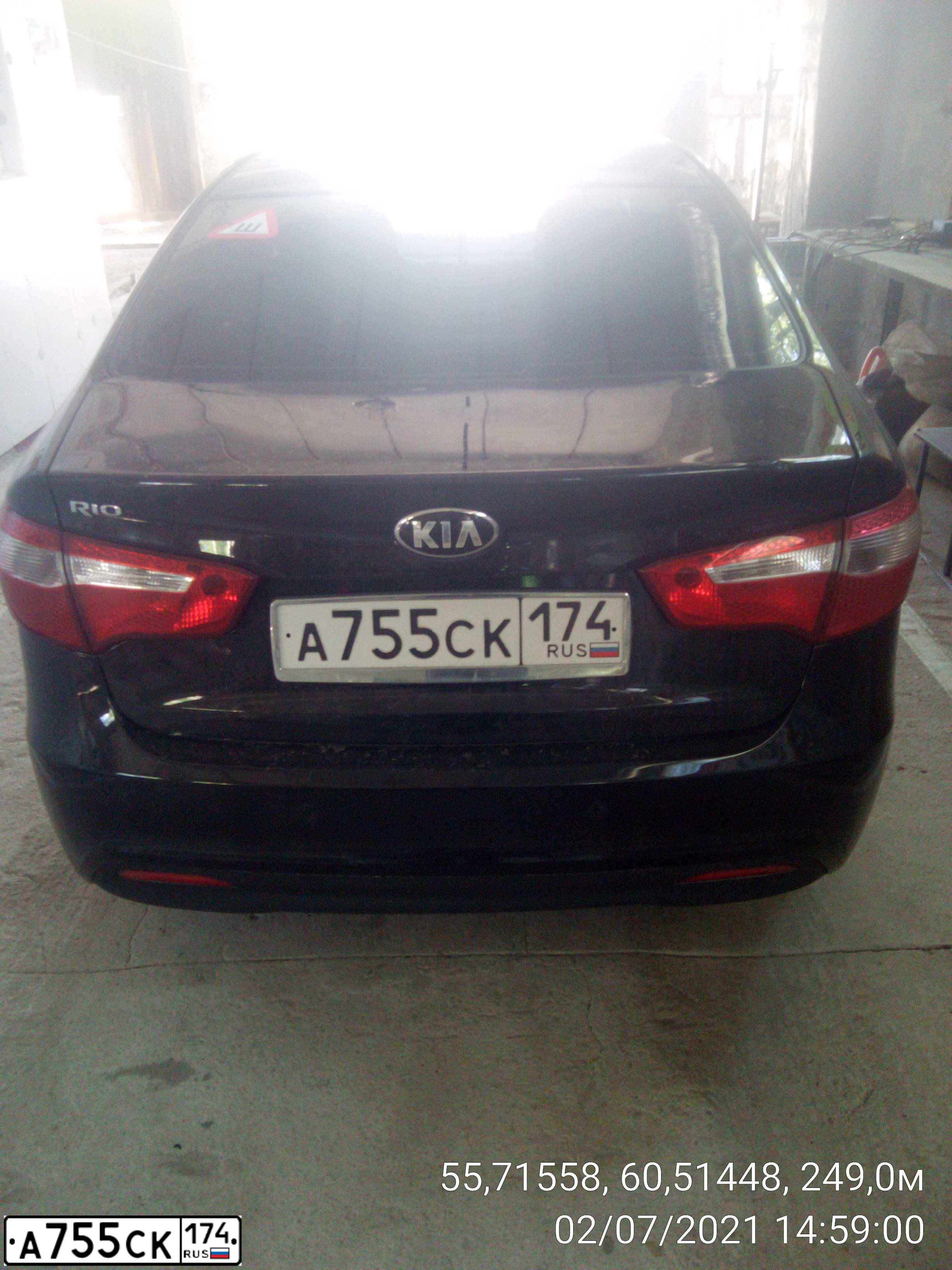 Фото автомобиля KIA RIO, 2014 — госномер А755СК174. Цвет: ЧЕРНЫЙ