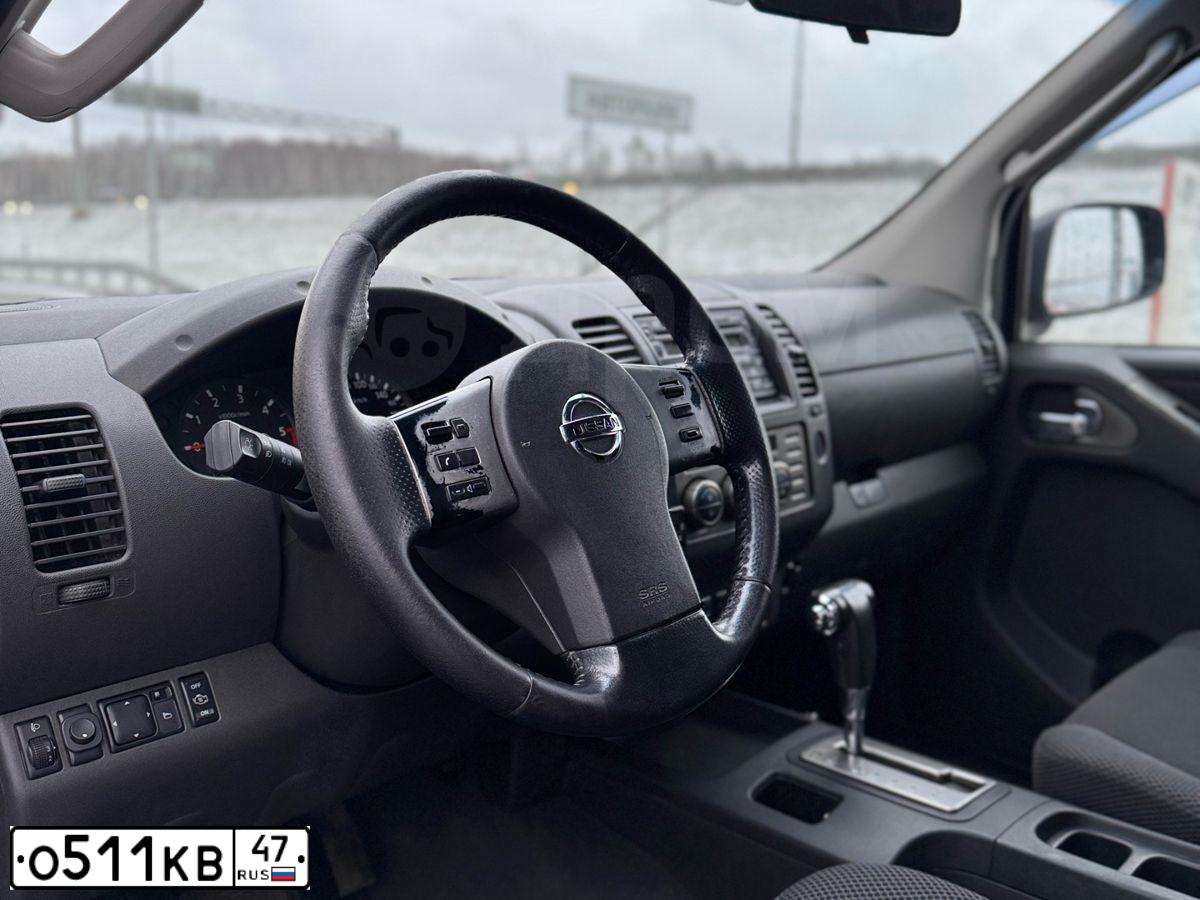 Фото автомобиля NISSAN NAVARA, 2007 — госномер В199ВК761. Цвет: Красный