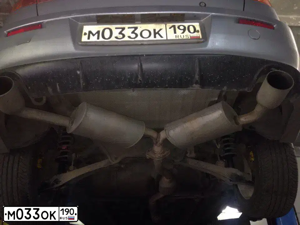 Фото автомобиля MITSUBISHI LANCER, 2008 — госномер М033ОК190. Цвет: СЕРЫЙ