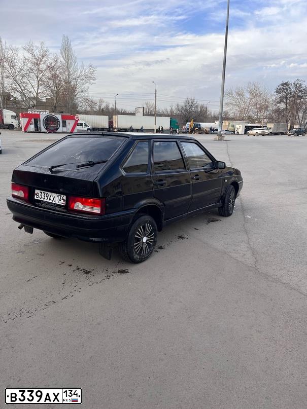 Фото автомобиля LADA 2114 SAMARA, 2008 — госномер В339АХ134. Цвет: Темно-зеленый