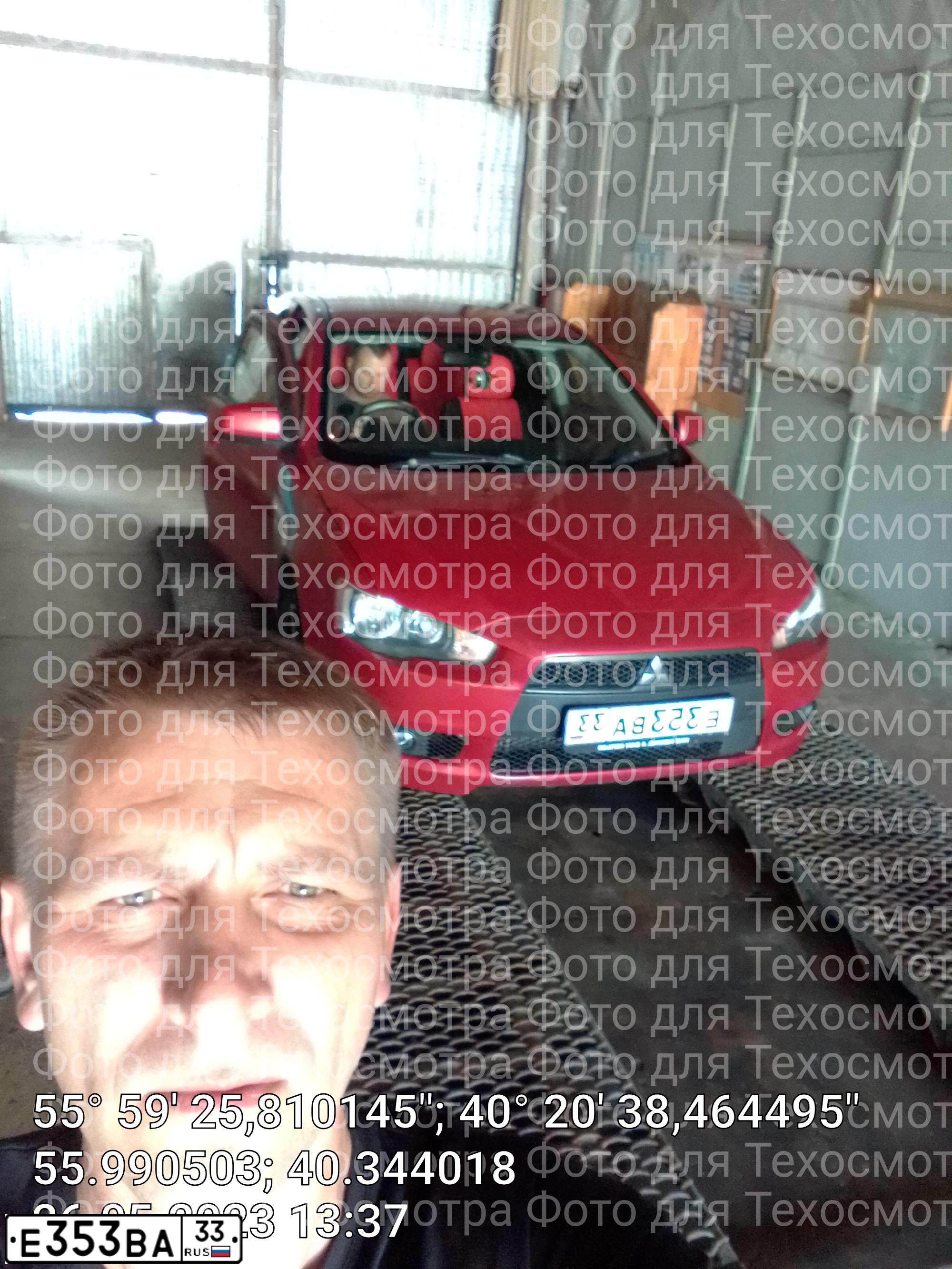 Фото автомобиля MITSUBISHI LANCER, 2010 — госномер К765УЕ33. Цвет: Красный