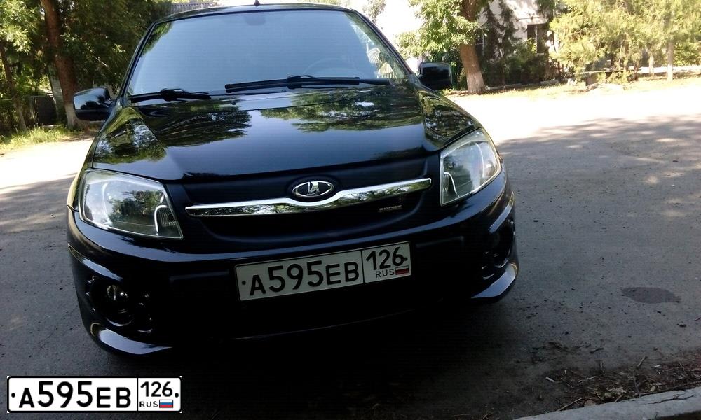 Фото автомобиля TOYOTA COROLLA, 2018 — госномер А595ЕВ126. Цвет: ЧЕРНЫЙ
