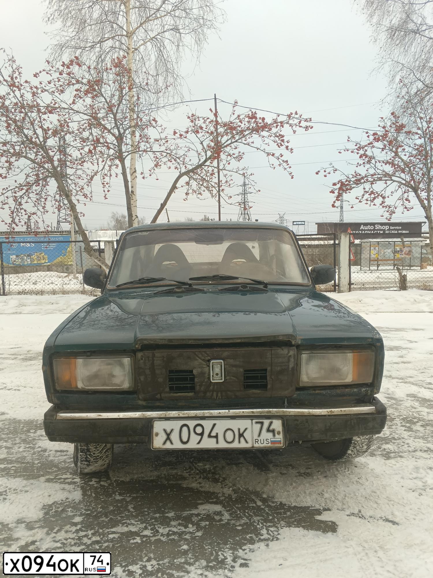Фото автомобиля LADA 2107, 2003 — госномер Х094ОК74. Цвет: Сине-зеленый