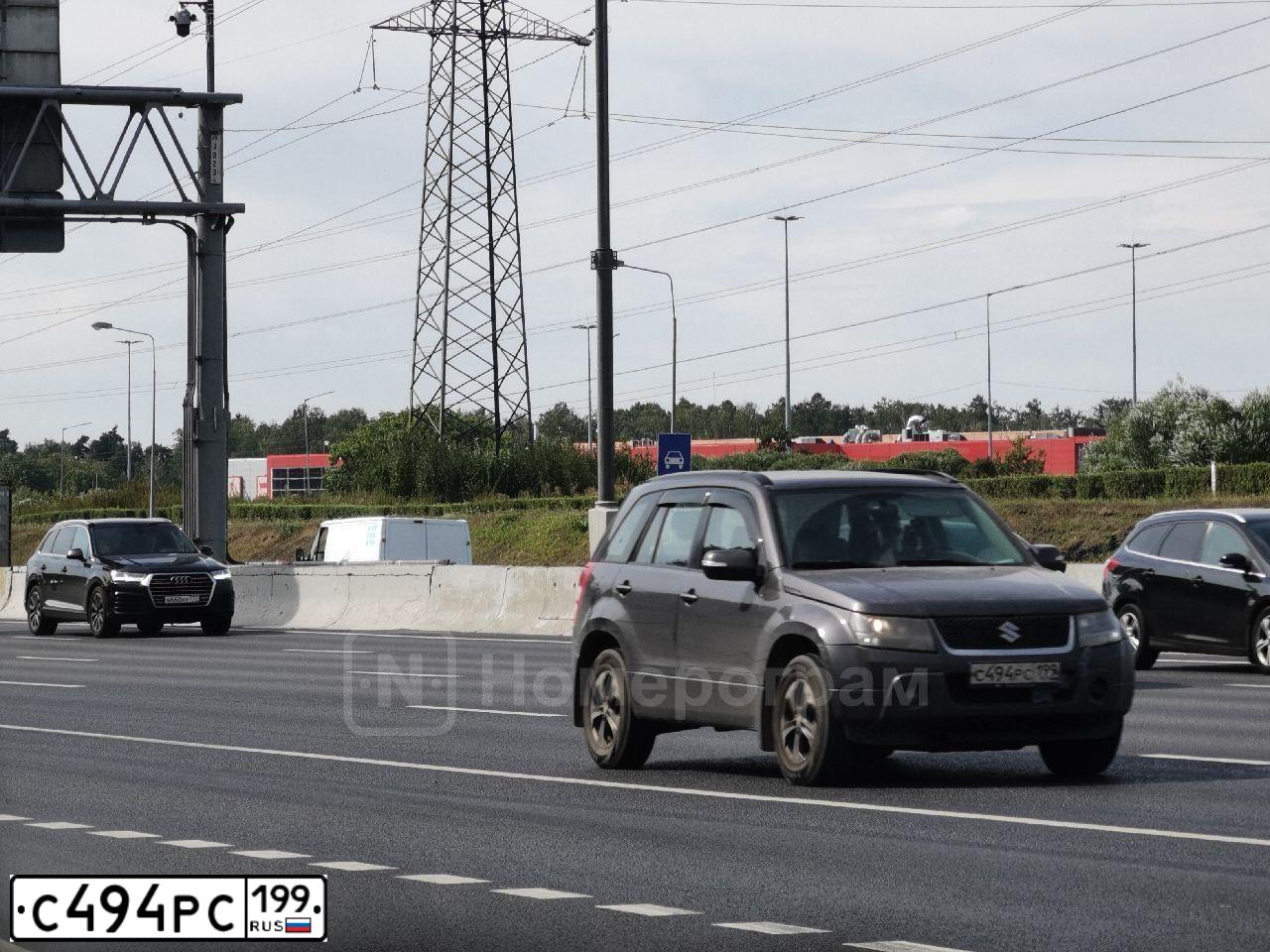 Фото автомобиля SUZUKI GRAND VITARA, 2008 — госномер С874АО250. Цвет: Серый