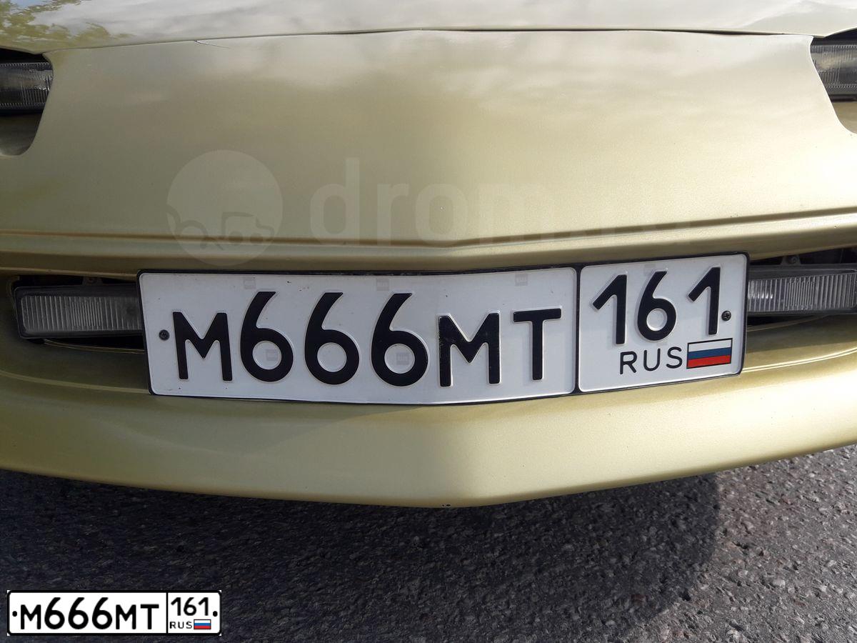 Фото автомобиля CHEVROLET CAMARO, 1996 — госномер Е209УА89. Цвет: ЗОЛОТИСТЫЙ