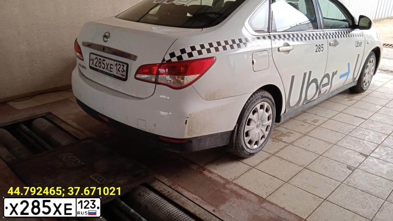 Фото автомобиля NISSAN ALMERA /AVTOVAZ/, 2015 — госномер Х285ХЕ123. Цвет: Белый