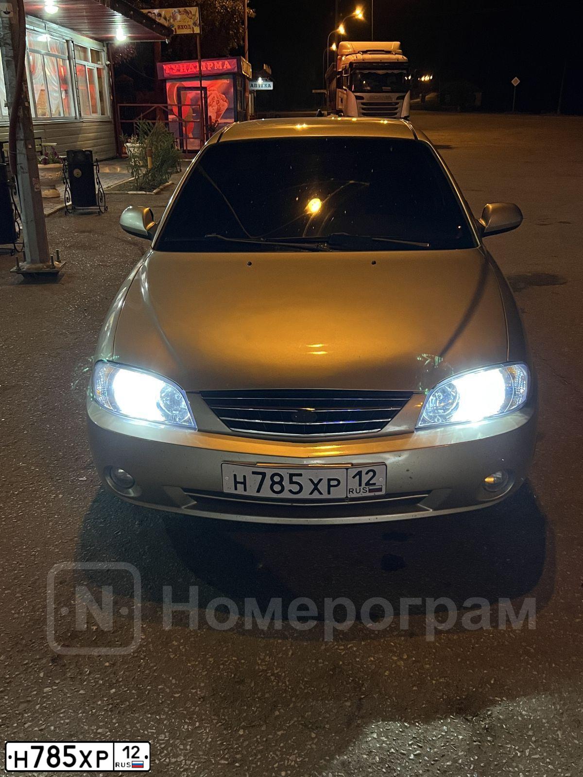 Фото автомобиля KIA SPECTRA, 2007 — госномер Р975ТС116. Цвет: Золотисто-бежевый