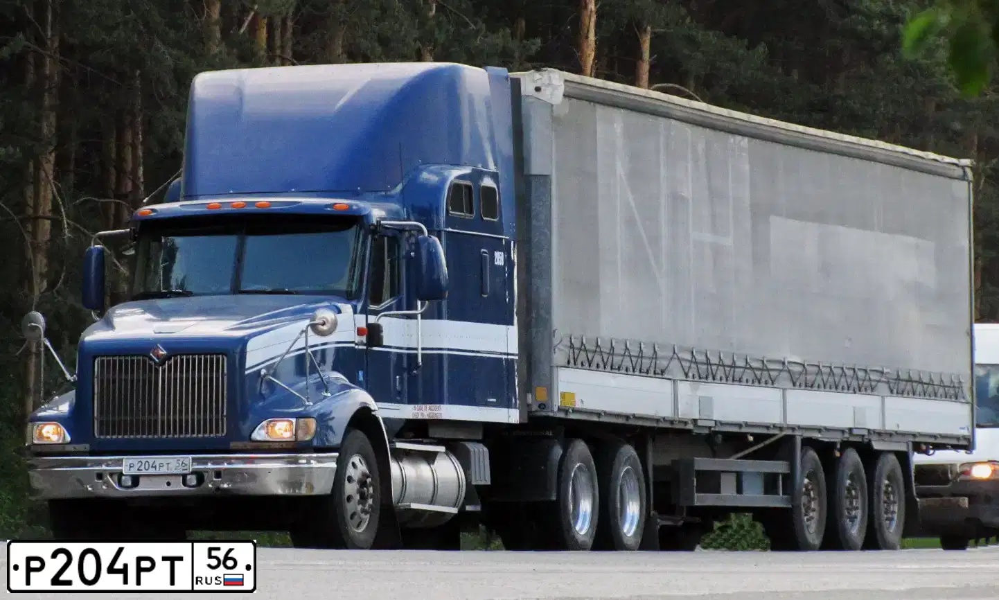 Фото автомобиля INTERNATIONAL HEAVY TRUCK 8500-9900, 2003 — госномер Р204РТ56. Цвет: СИНИЙ