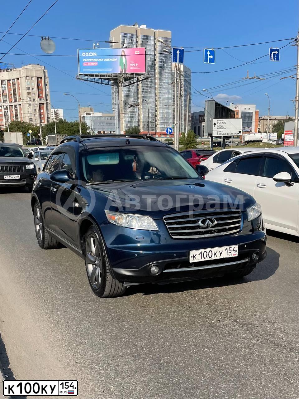 Фото автомобиля INFINITI QX70 /FX/, 2007 — госномер К100КУ154. Цвет: ТЕМНО-СИНИЙ